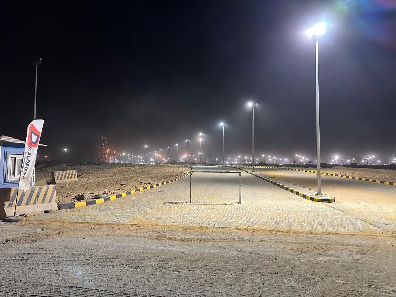 ROAD PAVING AND LIGHTING WORKS